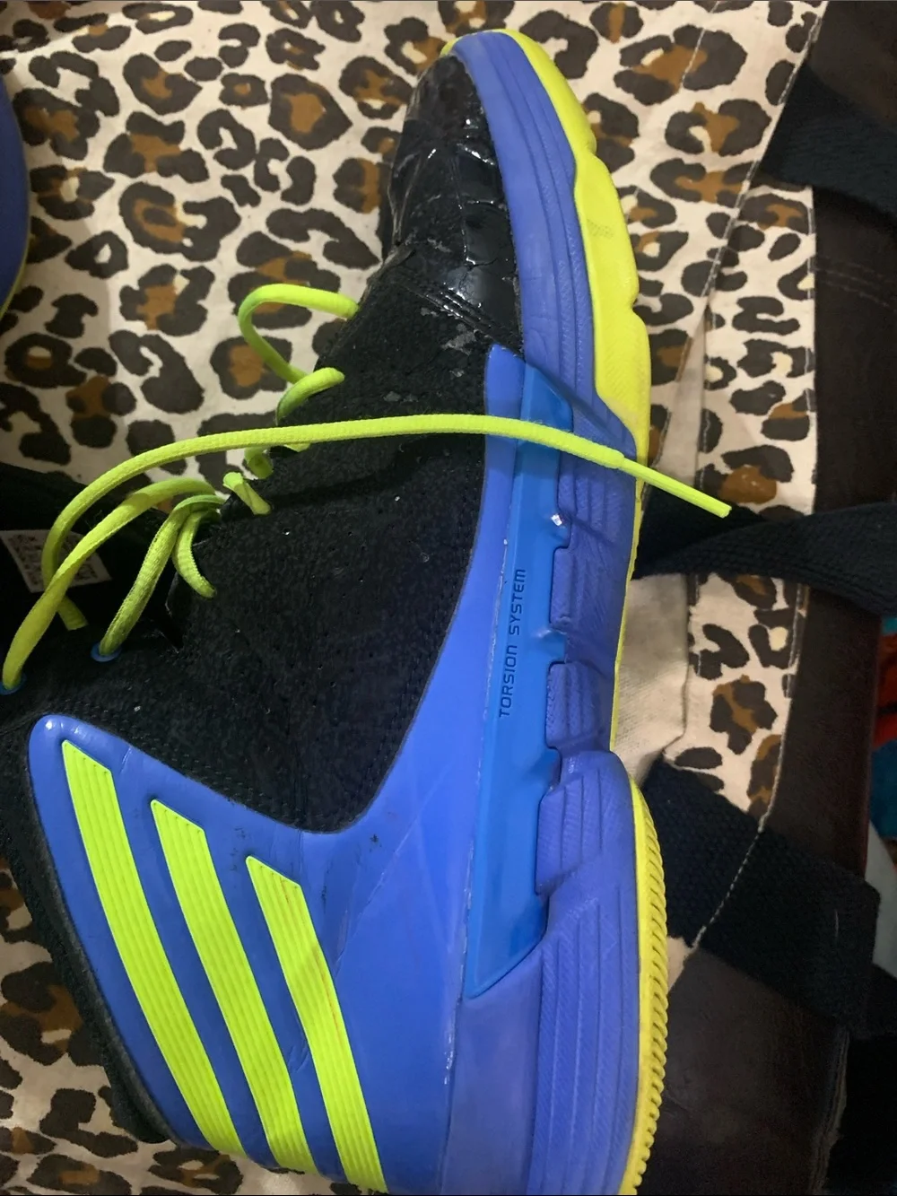 Black and Blue High-Top Athletic Shoes with Neon Yellow Laces